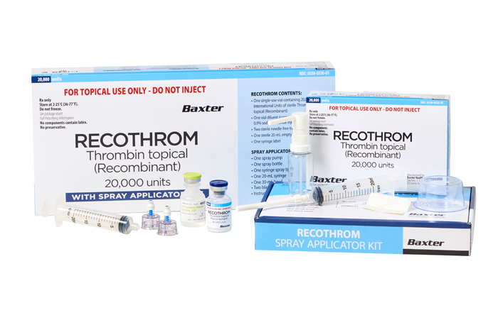 Image of three packages of Recothrom along with two vials and applicators